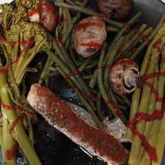 A picture of Steamed Salmon Fillets with Vegetables.