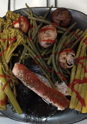 A picture of Steamed Salmon Fillets with Vegetables.