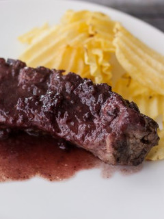 Una foto de Churrasco al chutney de frutos rojos
