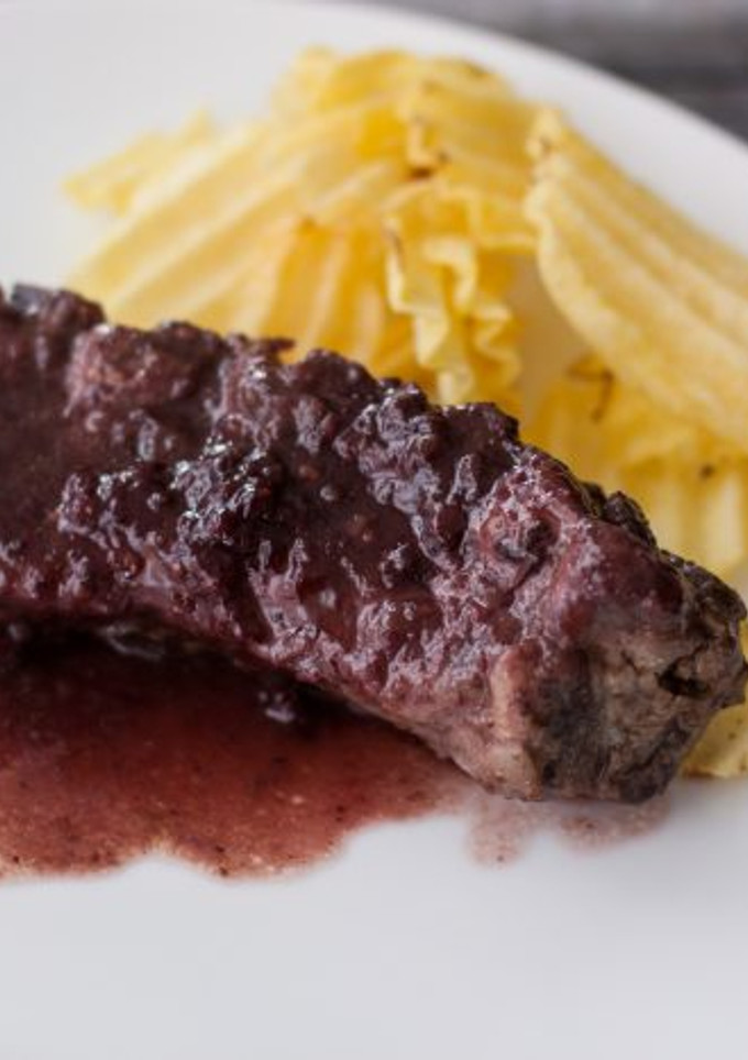 Una foto de Churrasco al chutney de frutos rojos
