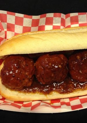 A picture of BBQ meatball subs.