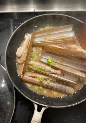 A picture of 🦪 Razor clams with soy sauce, vinegar, chilli and garlic sauce.