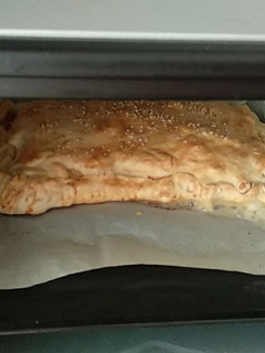 Una foto de Empanada de pechuga de pavo y queso