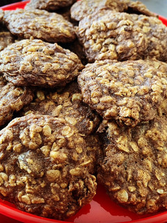 A picture of Oatmeal Raisin Cookies with walnuts.
