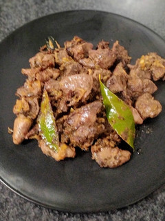 Una foto de Higaditos de pollo encebollados