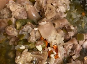 Una foto de Patitas de puerco en escabeche
