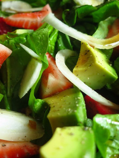 A picture of Strawberry Spinach Salad with Soy Worcestershire Dressing.