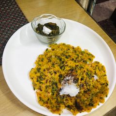 A picture of Makki Di Roti Sarso Da Saag Breakfast.