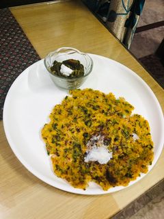 A picture of Makki Di Roti Sarso Da Saag Breakfast.
