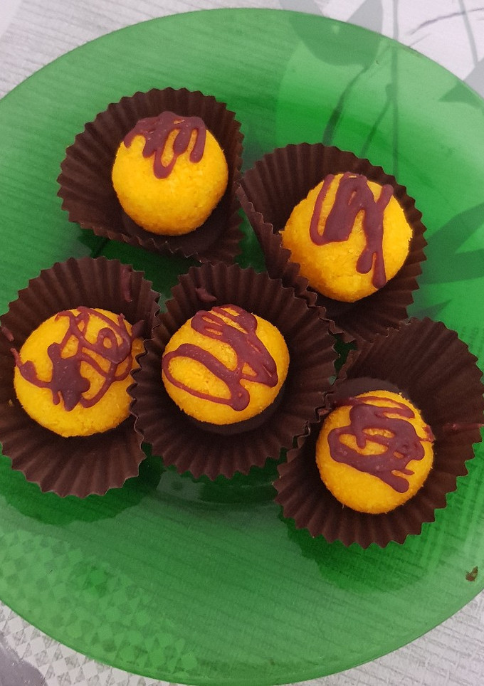 Una foto de Coquitos amarillos con toque de chocolate