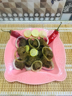 A picture of Beef tikka with gravy.