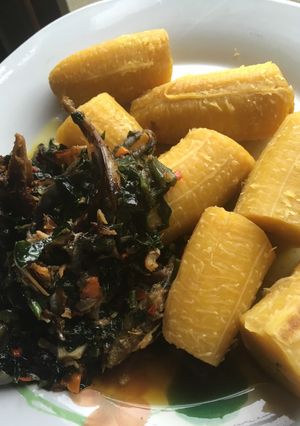 A picture of Half Ripe Plantain Meshed With Smoked Fish vegetable sauce.