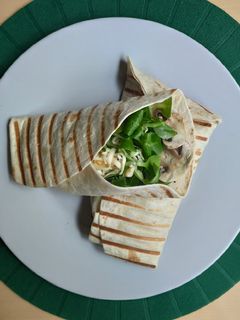 Una foto de Burritos de espinacas, champiñones y queso
