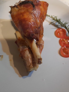 Una foto de Cabrito asado