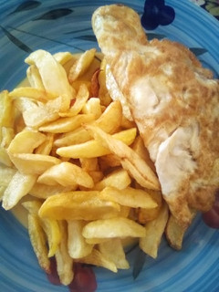 A picture of Chips with fried egg.