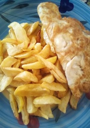 A picture of Chips with fried egg.
