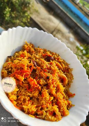 A picture of Gur Gajar ke meethe chawal/ (Sweet Jaggery Carrot Rice pudding).