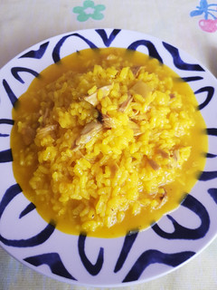 Una foto de Arroz caldosito con pollo