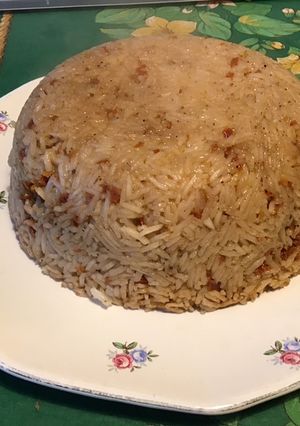 Une photo de Dôme de riz basmati aux tomates séchées