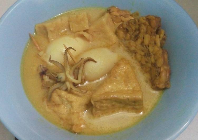 Bagaimana Membuat Cumi Isi Bumbu Kuning, Menggugah Selera