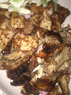 A picture of Roasted chicken with Gurasa & cocumber.