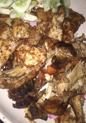 A picture of Roasted chicken with Gurasa & cocumber.