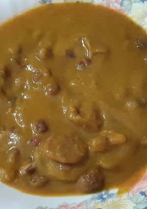 Una foto de Puré de champiñones y calabaza con alubias y chorizo
