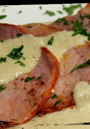Una foto de Lomo de cerdo en salsa de cebolla