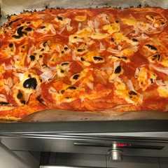 Una foto de Pizza light de jamón York y queso
