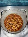 *Huevos Rancheros en Salsa Chipotlada con Cebolla Morada*
