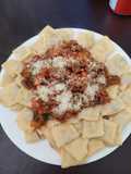 Ravioles con salsa foorte