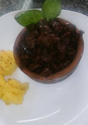 Una foto de Polenta grillada con ossobuco