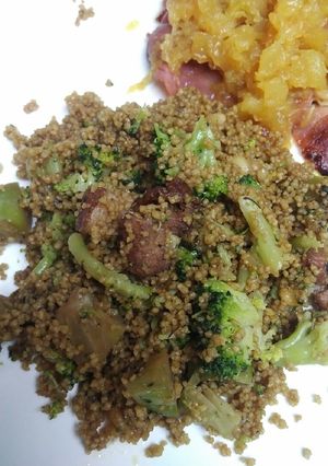 A picture of Couscous roasted pine nuts and Ham and Broccoli.