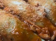 Una foto de canelones picadillo