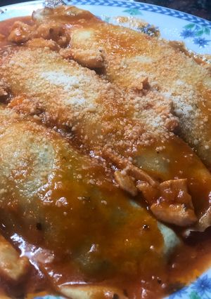 Una foto de Canelones de espinaca y picadillo