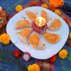 A picture of Rose shaped Khajyache Layered Kanavla (CKP style).