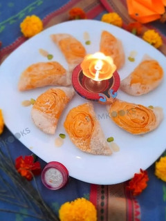 A picture of Rose shaped Khajyache Layered Kanavla (CKP style).