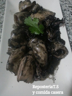 Una foto de Calamares en su tinta