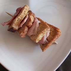 A picture of Eggy bread and bacon kebabs.