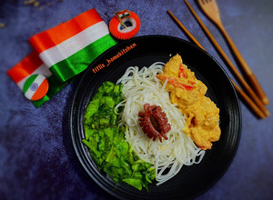 A picture of Shrimp Rice Noodles with stir fried vegetables.