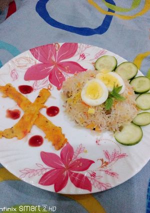 A picture of Corn egg fried rice.