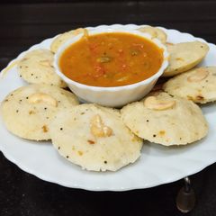 A picture of Semolina Idli with Sambar.