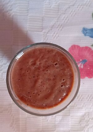 Una foto de Jugo de papaya con arándanos