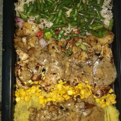 A picture of Chicken steak with mushrooms sauce & mashed potatoes.