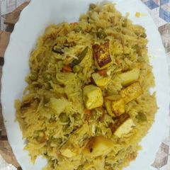 A picture of Green peas potato paneer polaw / basmati rice.