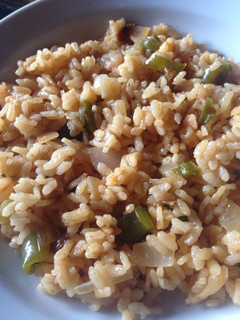 Una foto de Arroz seco con gambitas y peperoncino