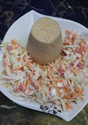 A picture of CousCous nd salad.