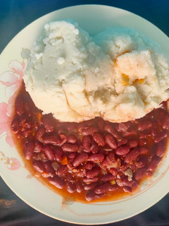 A picture of African style Rajma with Nsima and peri peri sauce.
