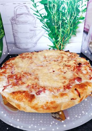 Une photo de Tarte moelleuse aux lardons fumés râpé de jambon, crème fraîche