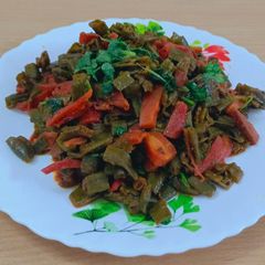 A picture of Carrots and flat beens(valor) sabji.